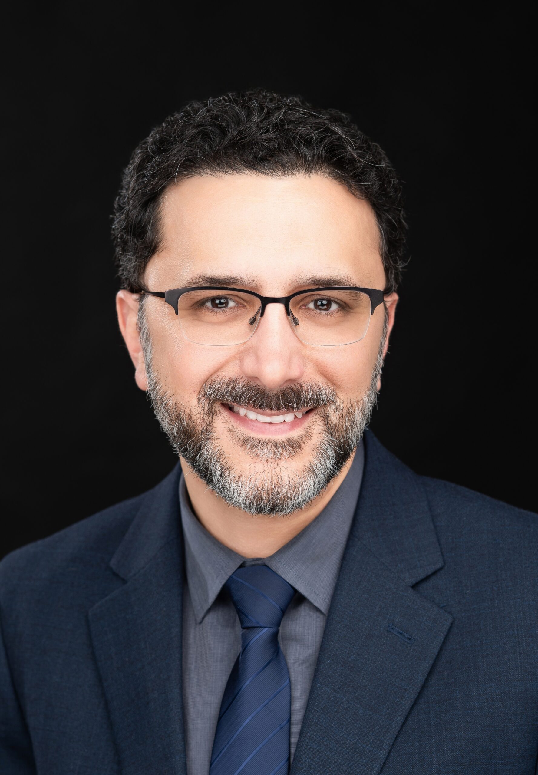 Headshot of Ali Rowhani-Rahbar